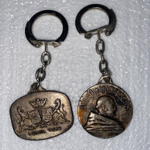 Vintage 1970s Dom Perignon Moet Collectors Keychains (2) - Picture 1 of 6